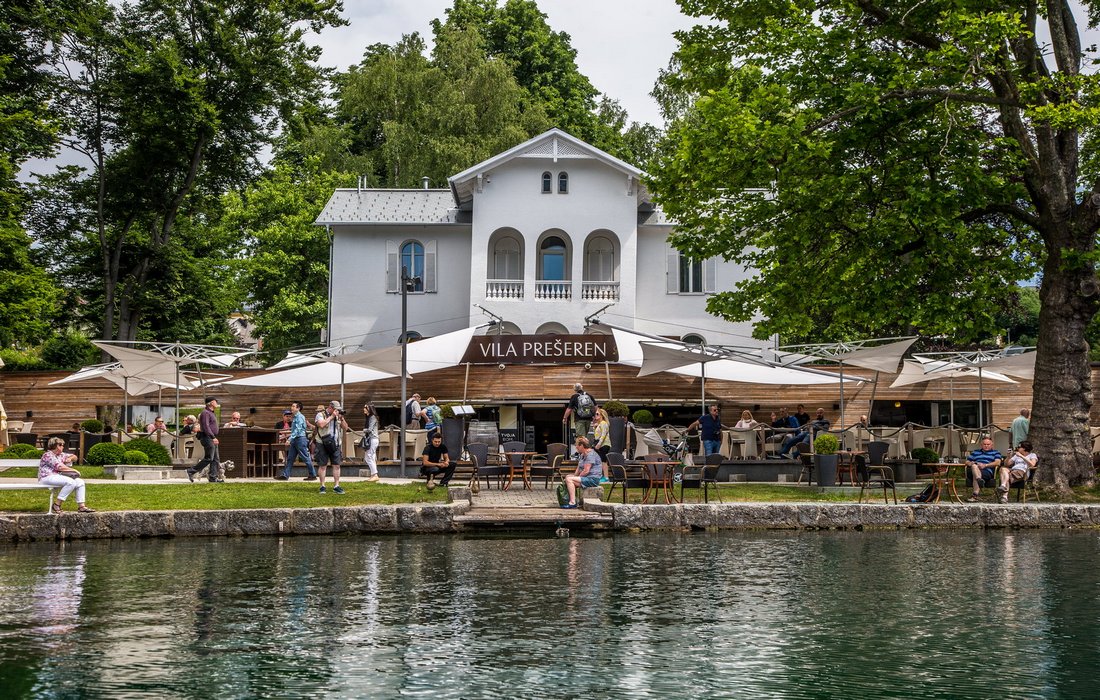 Sunny terrace of the Villa Preseren overlooking the lake Bled